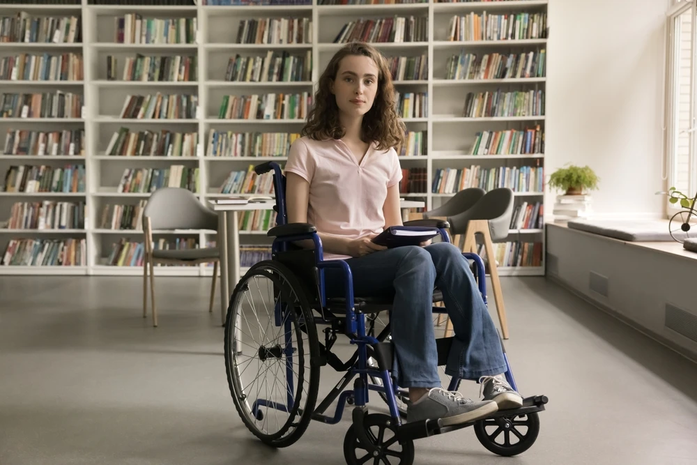 Disabled woman in library